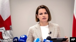 FILE - Belarusian opposition leader Sviatlana Tsikhanouskaya speaks during her news conference in Vilnius, Lithuania, Wednesday, July 7, 2021. (AP Photo/Mindaugas Kulbis)