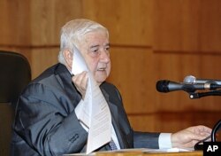 Walid al-Mouallem, durant sa conférence de presse du 14 novembre 2011 à Damas