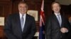 U.S. Secretary of Defense Leon Panetta, left, smiles next to his New Zealand counterpart Jonathan Coleman at the Government House in Auckland, New Zealand, Sept. 21, 2012.