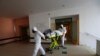 Health care workers transport a COVID-19 patient from an intensive care unit (ICU) at a hospital in Kyjov to a hospital in Brno, Czech Republic, Thursday, Oct. 22, 2020. Coronavirus infections in the Czech Republic are on a steep rise, setting a new…
