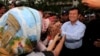 Cambodia National Rescue Party Deputy President Kem Sokha greets supporters during a rally in Phnom Penh, file photo. 