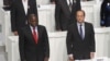 French President Francois Hollande and DRC President Joseph Kabila stand during the opening session of the Francophone Summit, in Kinshasa, DRC, Oct. 13, 2012. 