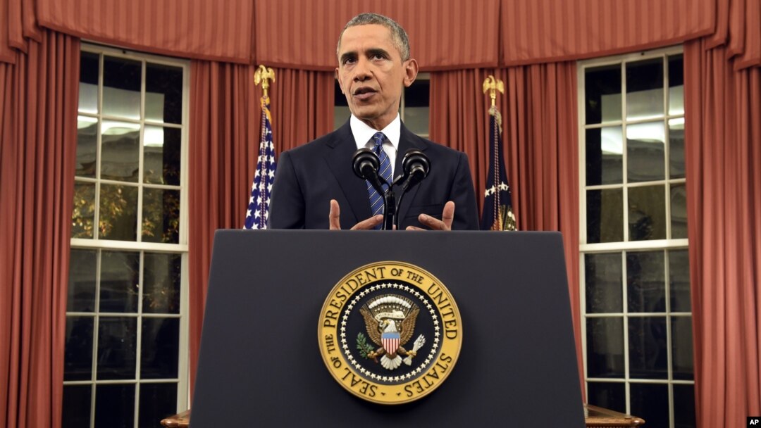President Barack Obama addresses the nation from the Oval Office at the White House in Washington, Sunday night, Dec. 6, 2015. (Saul Loeb/Pool Photo via AP)