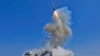 A Tomahawk cruise missile takes off from the USS Barry, one of four Navy destroyers positioned to take part in any U.S. attack on Syria. (file photo)