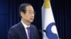 韩国代总统韩德洙在首尔发表讲话。(2024年12月26日)