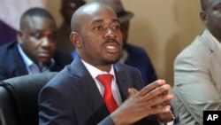 Opposition leader Nelson Chamisa addresses a media conference at party headquarters in Harare, Zimbabwe, Aug, 25, 2018. 