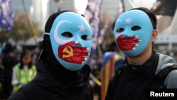 香港抗议者举行集会支持新疆维吾尔穆斯林的人权。（2019年12月22日）