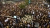 People march in a protest in Tel Aviv, Israel, Nov. 9, 2024 against Prime Minister Benjamin Netanyahu's government and call for the release of hostages held in the Gaza Strip by the Hamas militant group, marking 400 days since their capture. 