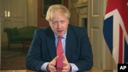 英国首相鲍里斯·约翰逊宣布英国将进入全国封城防疫状态。（2020年3月23日）