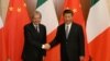 意大利前总理真蒂洛尼与中国国家主席习近平2017年5月16日在北京钓鱼台国宾馆举行双边会谈前握手。（资料照片）