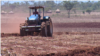 A tractor tills land at Magutu farm in Mazowe district, about 40 km (25 miles) north of Zimbabwe's capital Harare, Nov. 12, 2018, ahead of the rainy season, expected any time now. (C. Mavhunga/VOA)