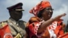 Malawi president Joyce Banda waves to the crowd gathered in Lilongwe for the official launch of her electoral presidential campaign, March 29, 2014 in Lilongwe. 