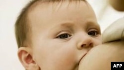 FILE - Breastfeeding