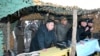 North Korean leader Kim Jong-Un (C) watches soldiers of the Korean People's Army (KPA) taking part in drills on March 25, 2013, in this picture released by the North's KCNA news agency.
