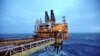 Oil Falls Below $56, Heads for Biggest Annual Drop Since 2008