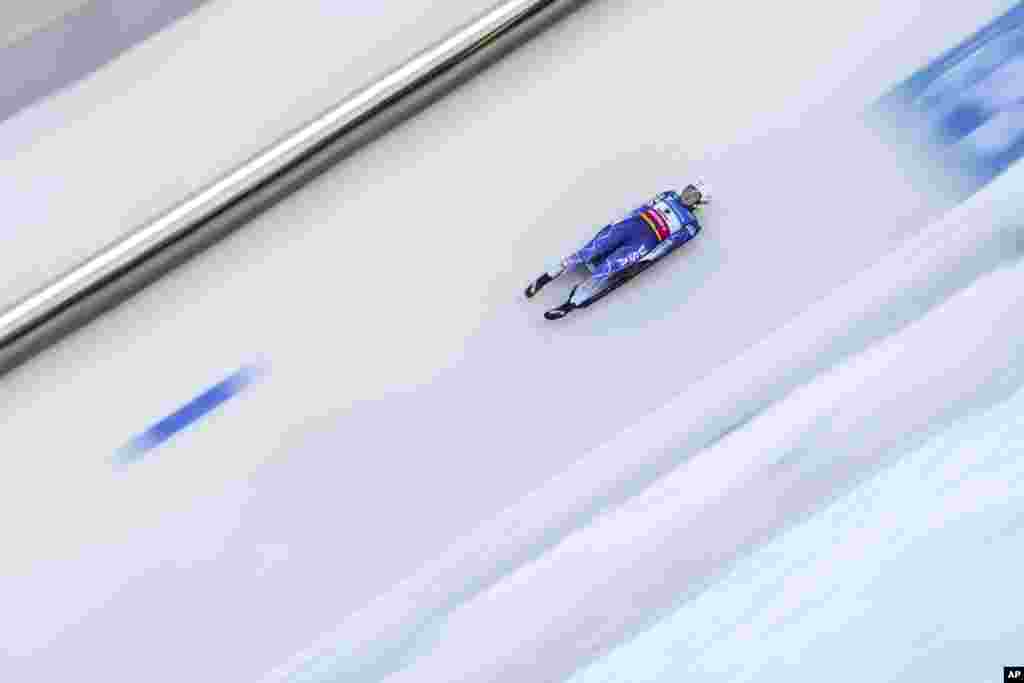 Brittney Arndt of the United States speeds down the track during the women&#39;s race at the Luge World Cup in Igls near Innsbruck, Austria.