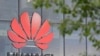 FILE - Signage is seen at Huawei offices in Reading, Britain, May 2, 2019. 