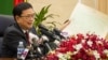 Var Kimhong, head of Cambodia’s border committee, hold a map of Dak Ta which is an area near Cambodian-Vietnamese border in a press conference about official map used for border post at the Council of Ministers on July 2nd, 2015. (Neou Vannarin/VOA Khmer)
