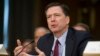 FILE - Then-FBI Director James Comey testifies before the Senate Intelligence Committee, on Capitol Hill in Washington, Jan. 10, 2017.