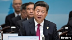 China’s President Xi Jinping speaks during the opening ceremony of the G-20 Summit in Hangzhou in eastern China's Zhejiang province, Sept. 4, 2016. 