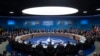 NATO Secretary General Jens Stoltenberg makes an opening statement during a plenary session at the NATO summit at The Grove, Dec. 4, 2019, in Watford, England. 