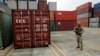 Police officer stands guard aboard North Korean-flagged freighter Chong Chon Gang, Manzanillo International container terminal, Colon City, Panama, July 17, 2013.