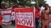 FILE - Scores of protesters chant "Bring Back Our Girls," about Nigerian students kidnapped by Boko Haram in April 2014.