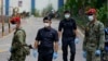 Malaysia Arrests Thousands Amid Coronavirus Lockdown