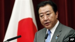 Perdana Menteri Jepang Yoshihiko Noda memberikan keterangan pers terkait perombakan kabinetnya di Tokyo (4/6). 