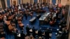 FILE - Supreme Court Chief Justice John Roberts swears in members of the Senate for the impeachment trial of President Donald Trump at the Capitol in Washington, Jan. 16, 2020.