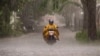 Landslide triggered by rain in Indonesia's Sumatra island kills 9 people in tourist bus 