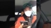 公民记者、前央视主持人李泽华2月26日探访武汉疫区途中疑遭警车尾随。（视频截图）