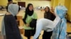 Volunteers with the Islamic Society of Greater Houston, pack donations at a mosque that was being used as a shelter, in Houston, Texas, Aug. 31, 2017.