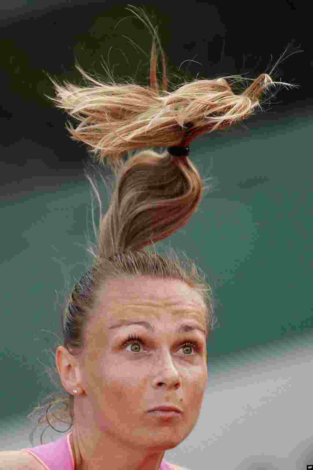 Slovakia's Magdalena Rybarikova serves against Coco Vandeweghe of the U.S. during their first round match of the French Open tennis tournament at the Roland Garros stadium, in Paris, France.