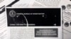 A photo shows a copy of an FBI pamphlet and related emails, Oct. 4, 2019. The FBI’s outreach to American colleges about the threat of economic espionage includes this pamphlet that warns specifically about efforts by China to steal academic research.
