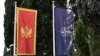 ARHIVA - Zastave Crne Gore i NATO-a ispred zgrade Ministarstva odbrane Crne Gore u Podgorici (Foto: AP/Risto Božović) 