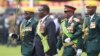 FILE: UMongameli Emmerson Mnangagwa, umsekeli wakhe uConstantino Chiwenga lenkokheli yebutho, Harare, Zimbabwe Friday, Nov. 24, 2017. 