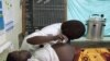 FILE - A pregnant woman in Uganda, September 27, 2011.