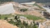 This Oct. 6, 2012 photo shows a construction site of a dam being built by China National Heavy Machinery Corporation on the Tatay River in Koh Kong province, some 210 kilometers (130 miles) west of Phnom Penh, Cambodia. 