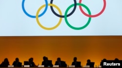 International Olympic Committee (IOC) delegates are seen during the IOC extraordinary session in Lausanne, Switzerland, July 11, 2017. 
