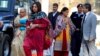 Former Indian navy officer Kulbhushan Sudhir Jadhav's mother Avanti (L) and wife, Chetankul, (3rd R) arrive to meet him at Ministry of Foreign Affairs in Islamabad, Pakistan, Dec. 25, 2017. 