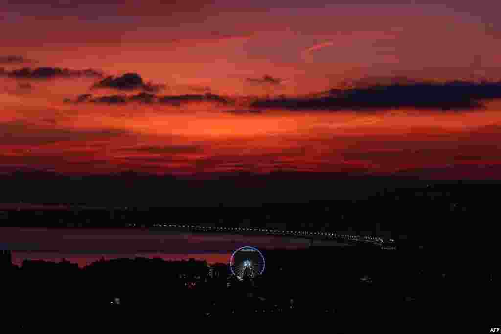 The "Baie des Anges" on the French Riviera in Nice is seen at sunset.