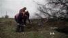 Ukrainian Volunteers Search for Bodies of Missing Soldiers