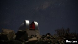 The Henrietta Swope telescope is seen at 'Las Campanas' Observatory, located in the Andes Mountains, in the Atacama Desert area, near Vallenar, Chile, October 14, 2021. Picture taken October 14, 2021. REUTERS/Pablo Sanhueza