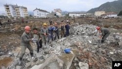 2016年9月16日洪水破坏地区恢复工作进行中