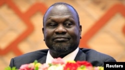 South Sudan rebel leader Riek Machar attends the signing of a peace agreement with the South Sudan government aimed to end a war in which tens of thousands of people have been killed, in Khartoum, Sudan, June 27, 2018.