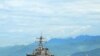 The guided-missile destroyer USS John S. McCainapproaches Da Nang, Vietnam for a scheduled five-day engagement commemorating the 15th anniversary of the normalization of relations between Vietnam and the United States