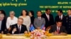 Australian Immigration Minister Scott Morrison, front left, signs a document together with Cambodian Interior Minister Sar Kheng, front right, during a signing ceremony of a controversial deal on resettlement of refugees inside the Interior Ministry in Ph