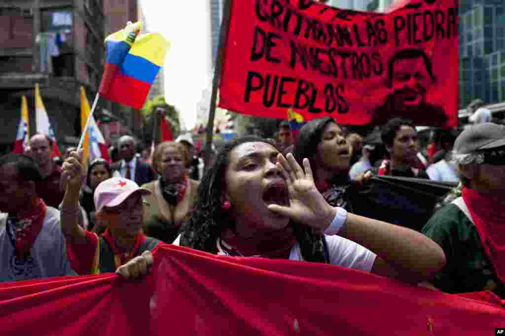 Members of a pro-government "colectivo," or "collective," march in downtown Caracas, Feb. 20, 2014.