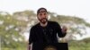 Salvadoran President Nayib Bukele gestures as he delivers his speech during the inauguration of a plan to combat a flying locust plague in San Nicolas Lempa, San Vicente, El Salvador on July 18, 2020. - The President of El Salvador, Nayib Bukele, ordered…